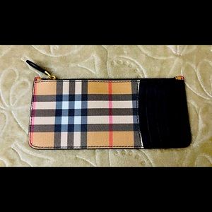 100% Authentic Burberry Long Zip Coin Wallet with 4 Slots for Cards.